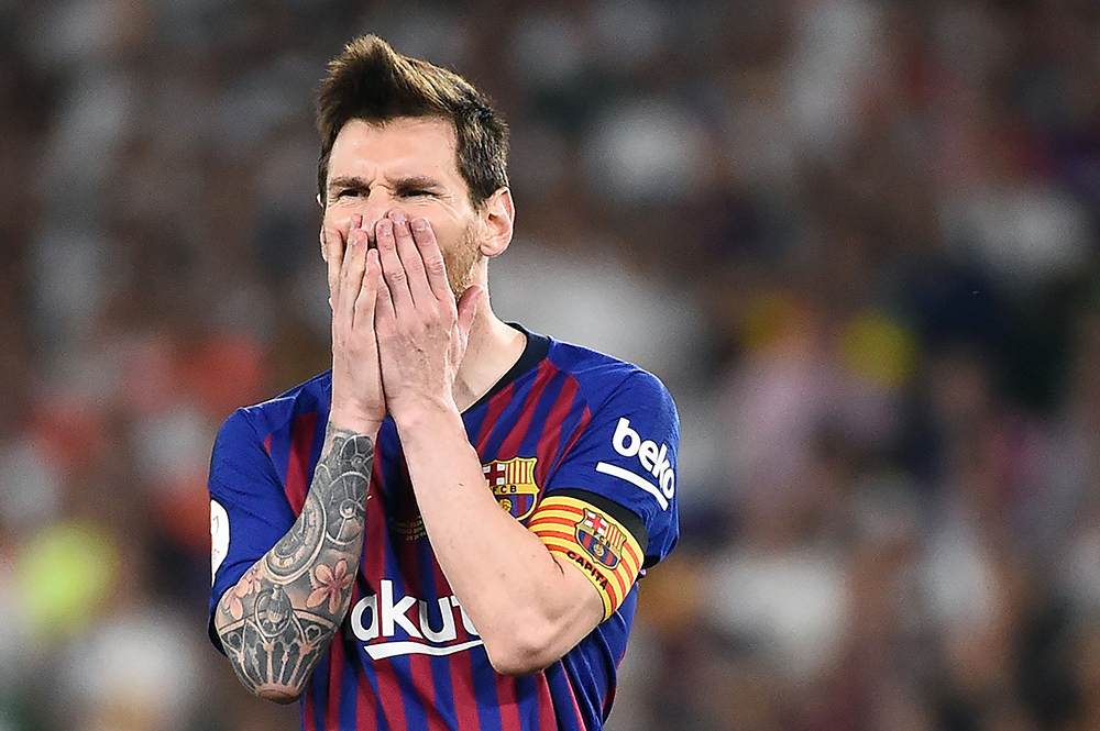 zzzzinte1Barcelona's Argentinian forward Lionel Messi reacts to missing a free kick during the 2019 Spanish Copa del Rey (King's Cup) final football match between Barcelona and Valencia on May 25, 2019 at the Benito Villamarin stadium in Sevilla. (Photo by JOSE JORDAN / AFP)zzzz