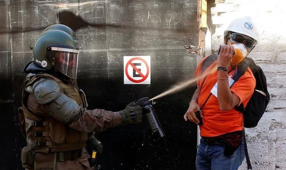 “Ley antiencapuchados” y de exención penal para Carabineros en Chile