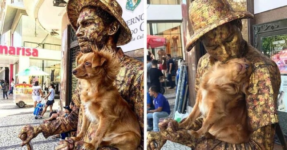 La “perrita estatua” que actúa con su dueño en las calles de Brasil