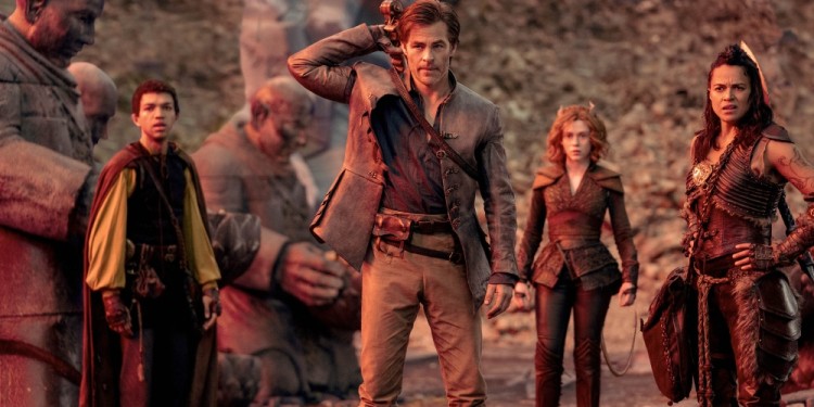 Justice Smith plays Simon, Chris Pine plays Edgin, Sophia Lillis plays Doric and Michelle Rodriguez plays Holga in Dungeons & Dragons: Honor Among Thieves from Paramount Pictures.