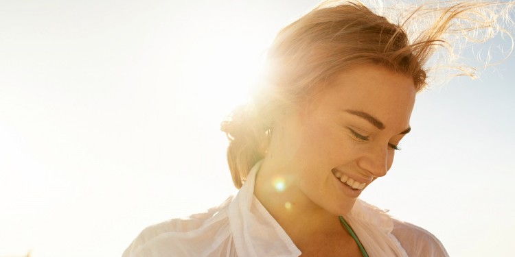 Shot of a beautiful young woman at the beach