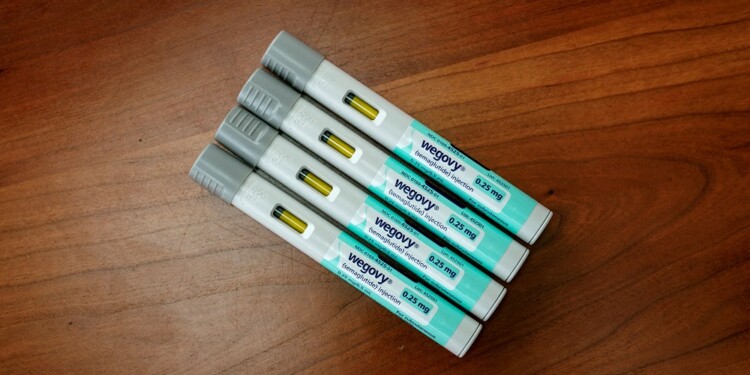FILE PHOTO: A selection of injector pens for the Wegovy weight loss drug are shown in this photo illustration in Chicago, Illinois, U.S., March 31, 2023. REUTERS/Jim Vondruska/Illustration/File Photo