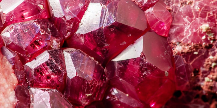 Inside of amathyst quartz geode. aquamarine natural quartz blue gem geological crystals texture background. vertical photo